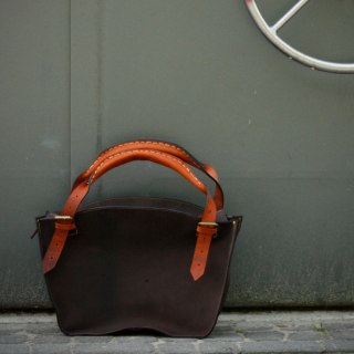 Leather bag Kuferek color dark brown and orange