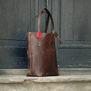Zuza brown leather bag with red accents
